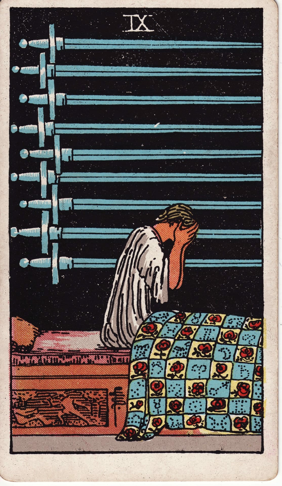 Nueve de Espadas tarot card - Arcanos menores - ansiedad, preocupación, pesadillas